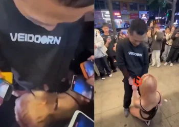 Changsha giáo viên 35 tuổi Trung Quốc ăn kẹo giữa đường